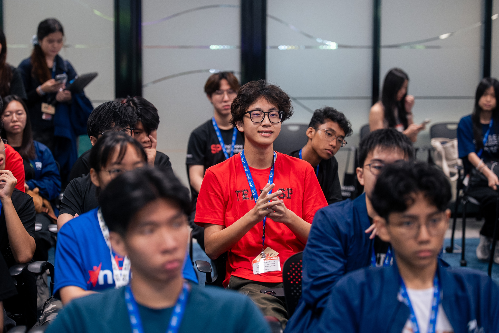 Student delegates attend a Learning Journey at AWS.